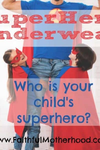 Two children clinging to a superhero dad's legs. Title: SuperHero Underwear - who is your child's superhero?